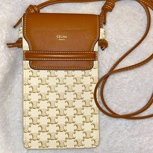 Brand new Never used Celine crossbody cell phone holder.